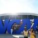 Fans pose for photos in front of a giant NCAA logo outside of the Georgia Dome before the start of the Final Four in Atlanta on Saturday, April 6, 2013. Melanie Maxwell I AnnArbor.com